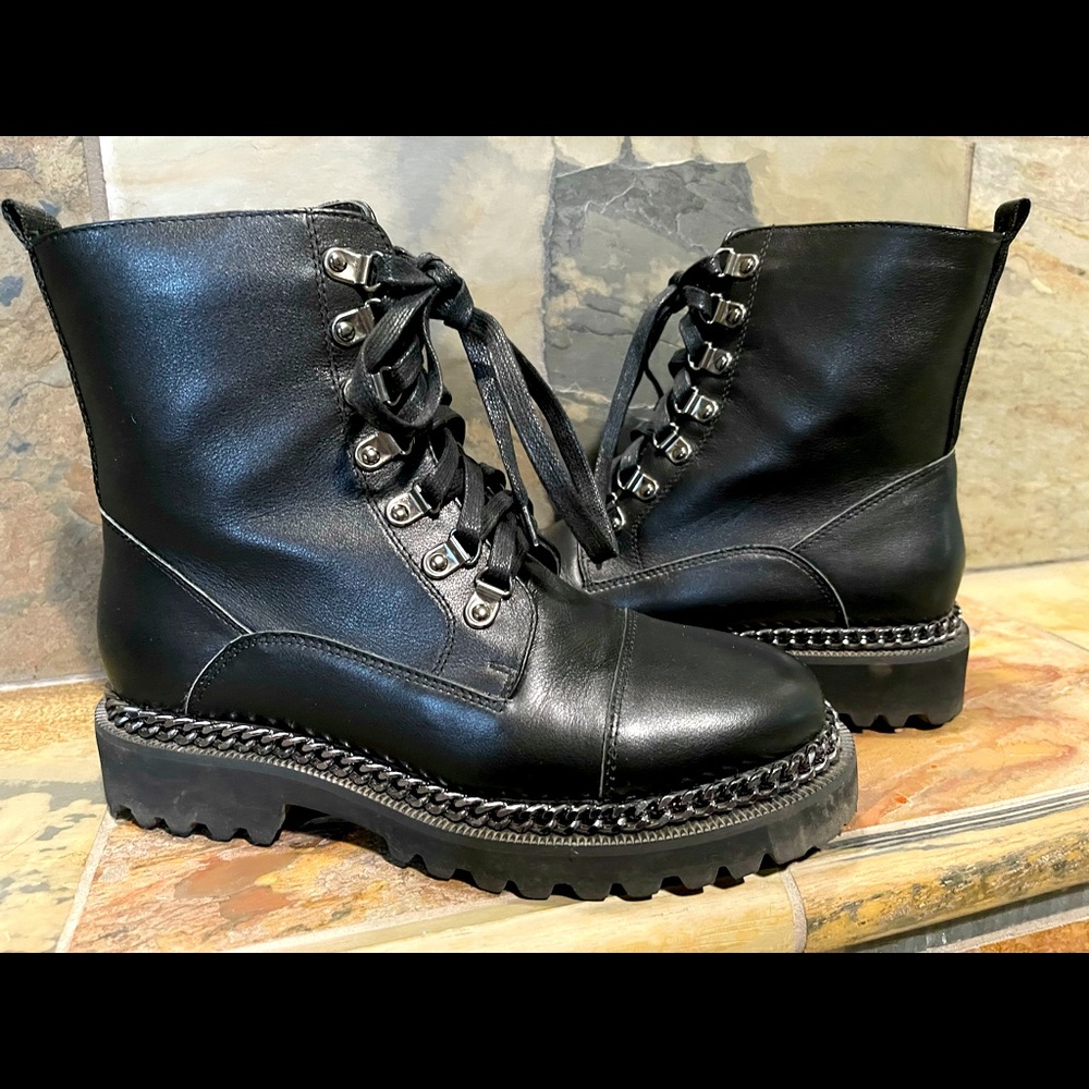 Vince Camuto combat boots with chain detail.